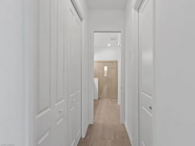 Walk In closet and Standard closet to Primary Bathroom