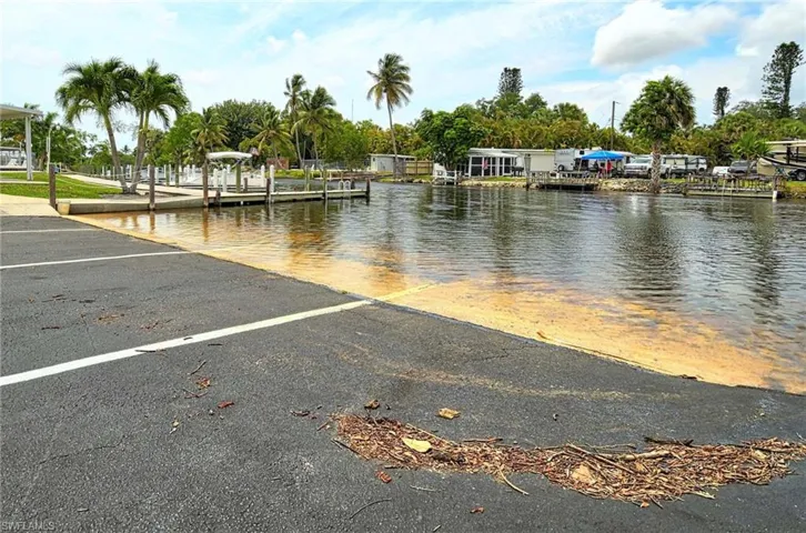 View of water feature with a dock