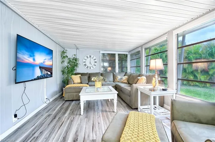 Sunroom featuring a wealth of natural light