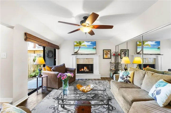 Cozy wood burning fireplace in your living area. The chair on the left is a fold out single bed!