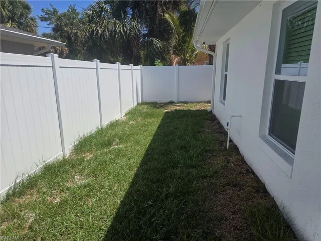 View of fenced backyard