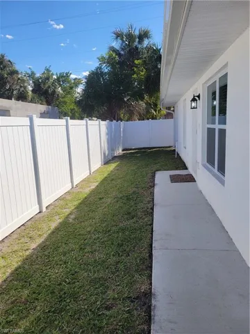 View of fenced backyard