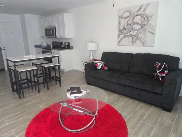 Living area with wood finish floors