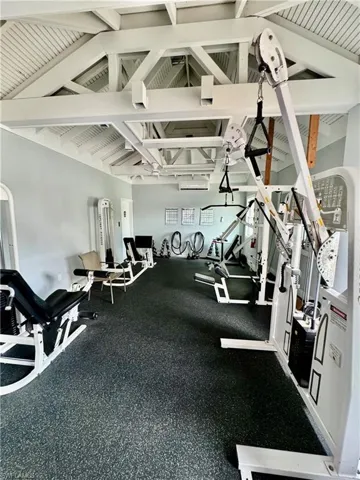 Gym featuring an AC wall unit