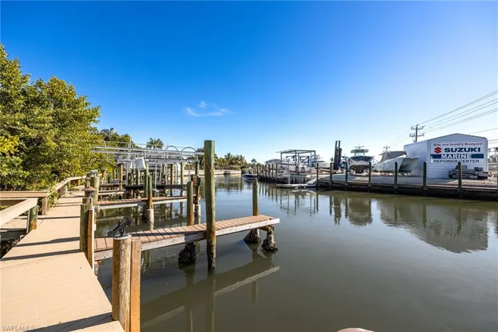 Dock with a water view and boat lift