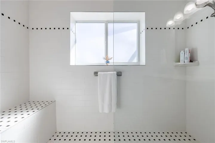 Bathroom with a tile shower