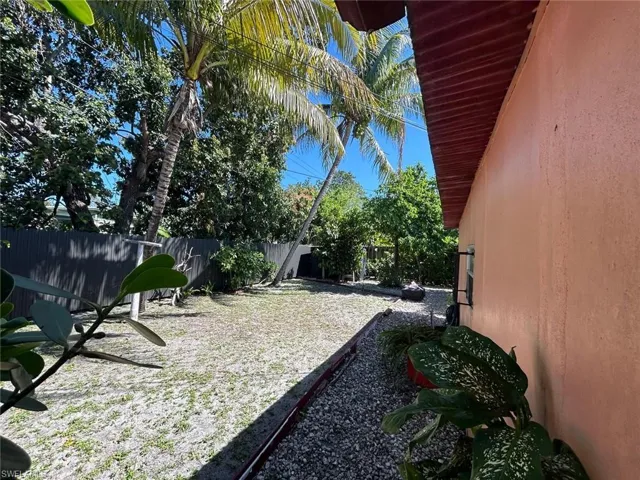View of fenced backyard