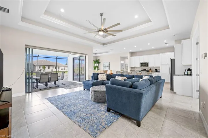 Spacious Great Room with Double Tray Ceiling with crown molding