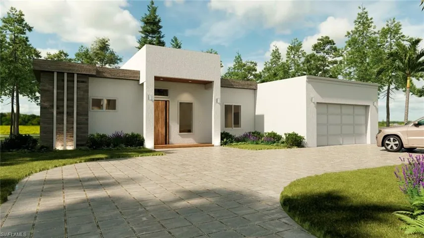 Contemporary house with decorative driveway, a garage, stucco siding, and a front lawn