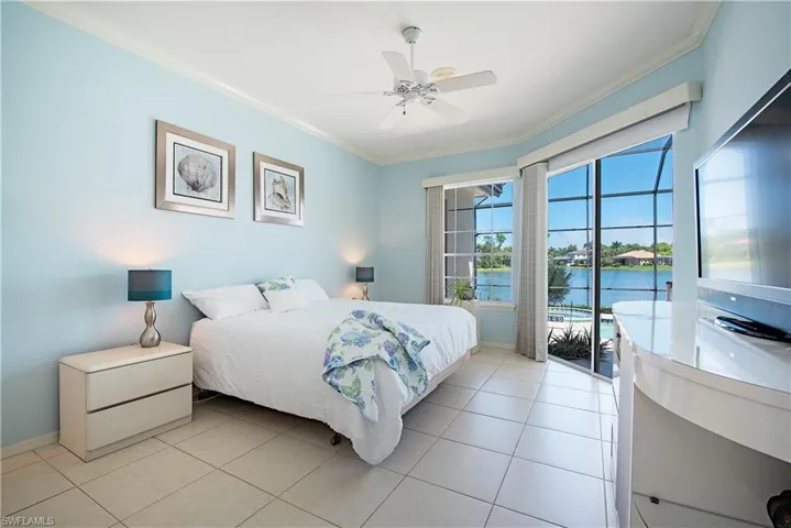 Spacious living with numerous views of the pool and lake