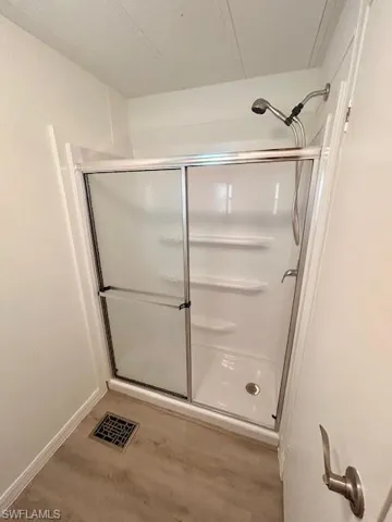 Primary Bathroom featuring walk in shower