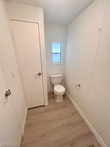 New commode in primary bathroom.