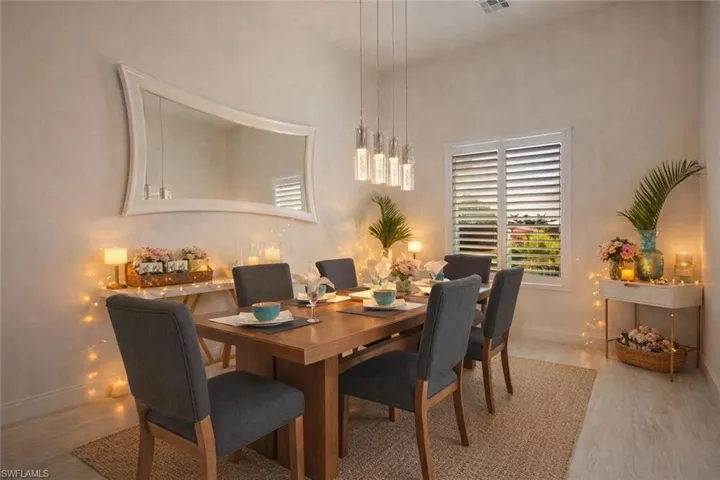 Dining space with light wood finished floors