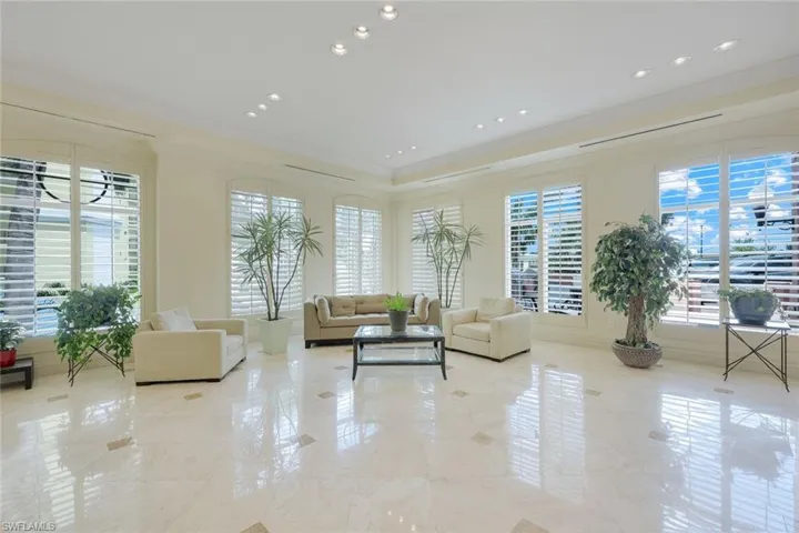 Building lobby with ornamental molding and recessed lighting