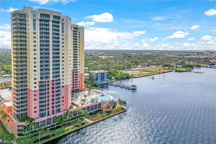 Bird's eye view of a large body of water and apartment complex