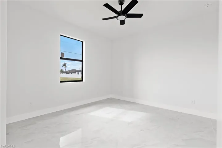 Unfurnished room with ceiling fan