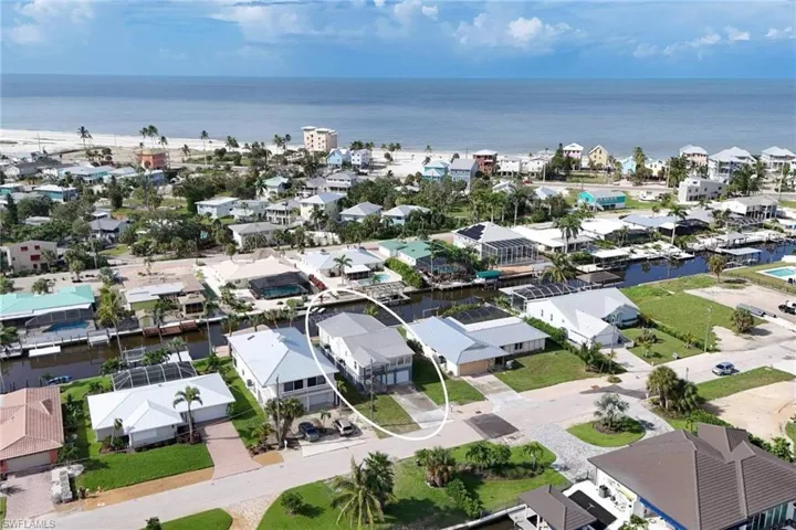 Drone / aerial view showing proximity to sugar sand beach