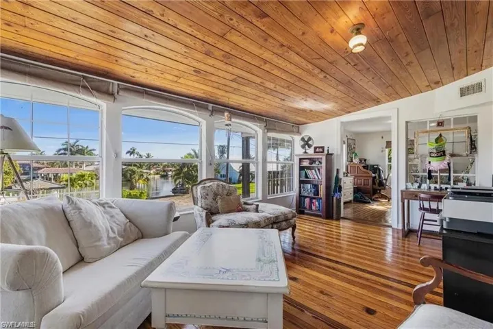 Great room looking toward family room at entry to home