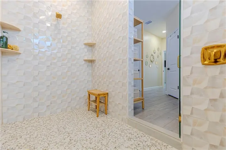 Bathroom with a tile shower