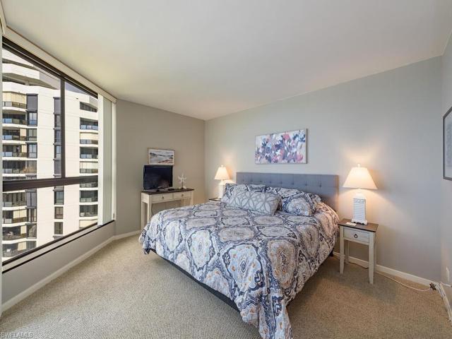 Large master bedroom easily fits a kng size bed.
