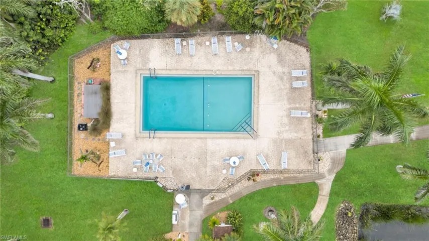 Drone / aerial view of a pool area
