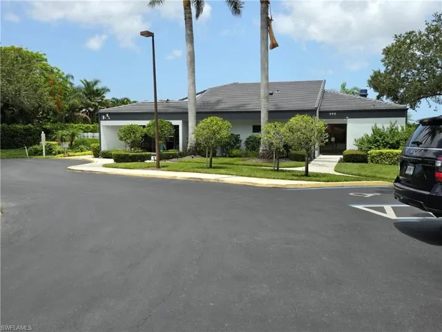 View of front of property with uncovered parking