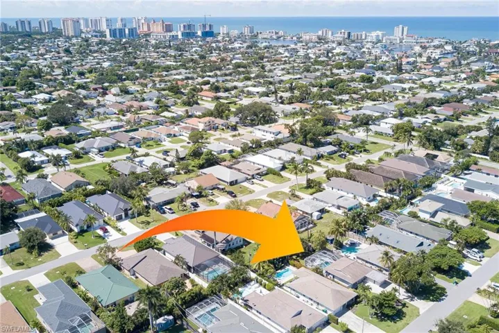 View of property location with nearby suburban area