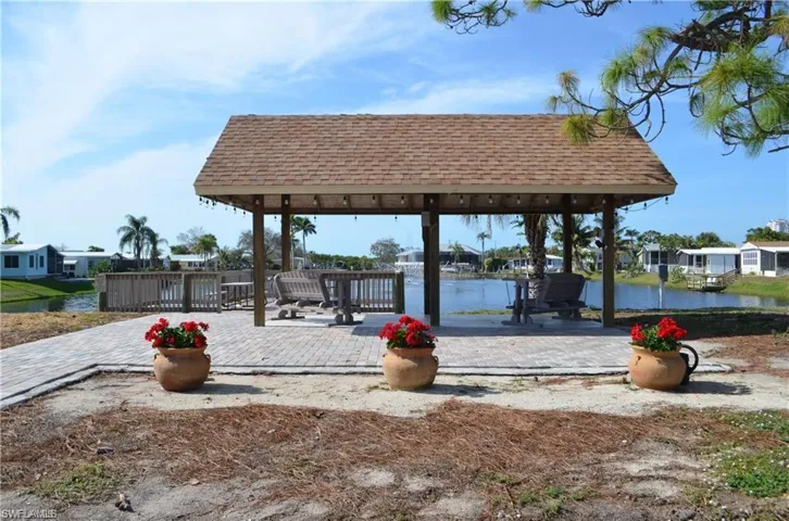 Community Lake with covered gazebo & swings