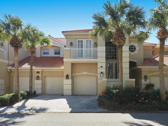 Second-floor unit WITH AN ELEVATOR AND SPECTACULAR GOLF COURSE VIEWS!