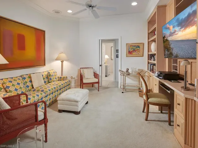 Comfortable den or flex space, perfect for an office or additional lounge area.