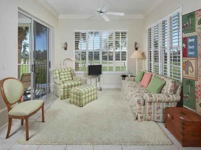 Cozy sitting area with lanai access for true indoor-outdoor living.