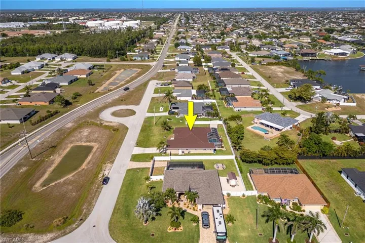 Birds eye view of property featuring a residential view and a water view
