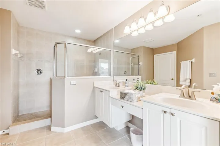 Main bathroom with dual sinks.