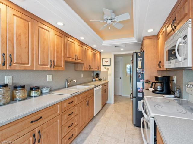 This is another kitchen view, and a peek of utility room, with brand new washer & dryer.