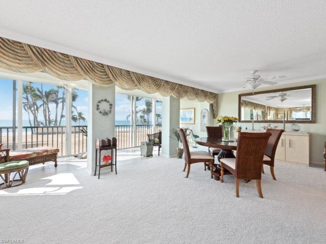 Peeking through to the sunroom adjacent to dining area and part of living room.