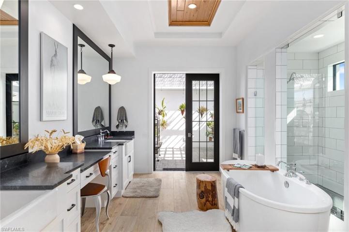 Free Standing Soaking Tub, twin vanities, extra large walk in shower