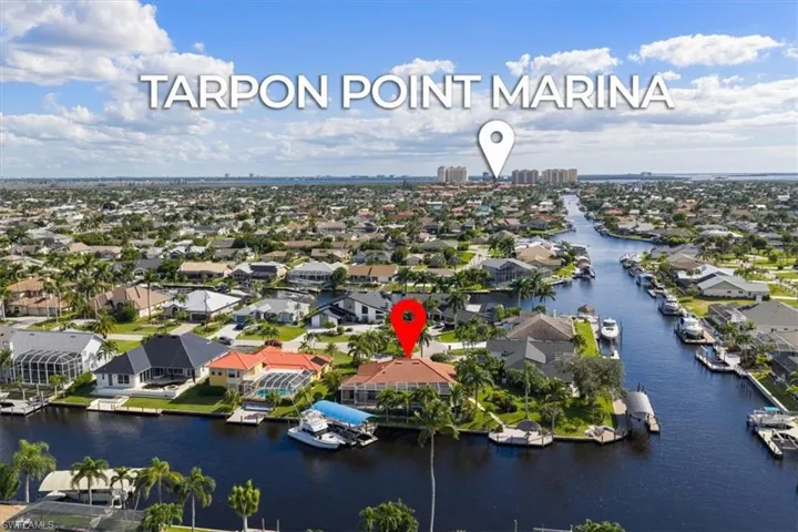 Aerial of both docs and lania- boat available for sale outside of home purchase