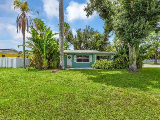 View of front of house with a front yard