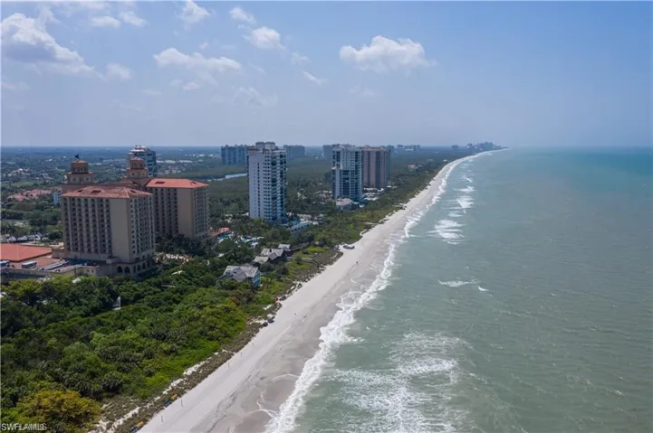 Drone / aerial view of Vanderbilt Beach and the Ritz Carlton