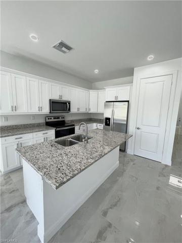 Modern kitchen with a nice Island and pantry.