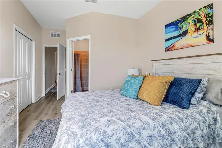 Bedroom featuring a closet and light wood-type flooring