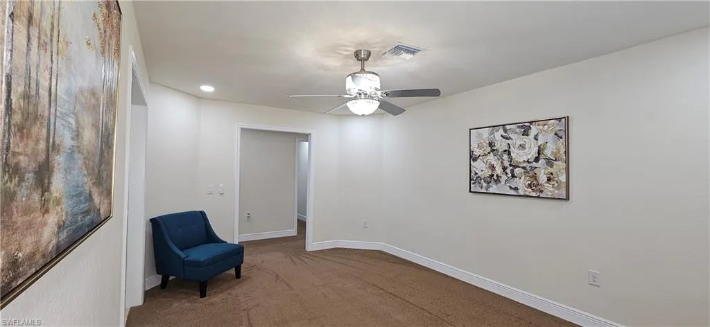 Unfurnished room with carpet floors, ceiling fan, baseboards, and recessed lighting