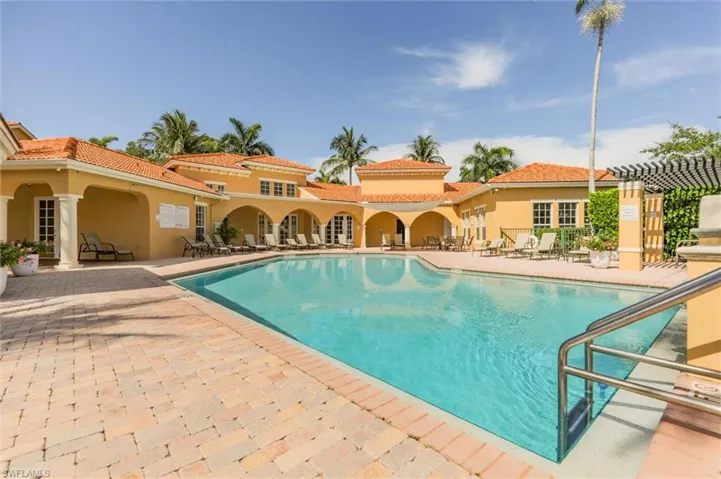 View of swimming pool with a patio area