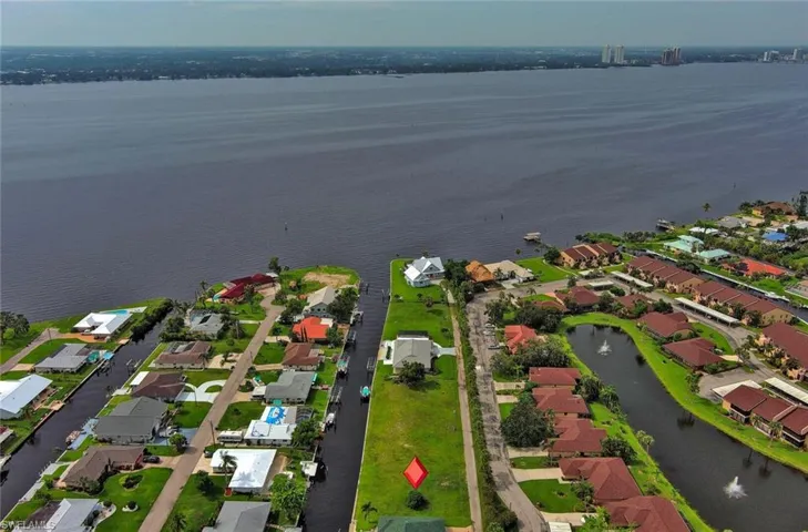 Bird's eye view with a water view and a residential view