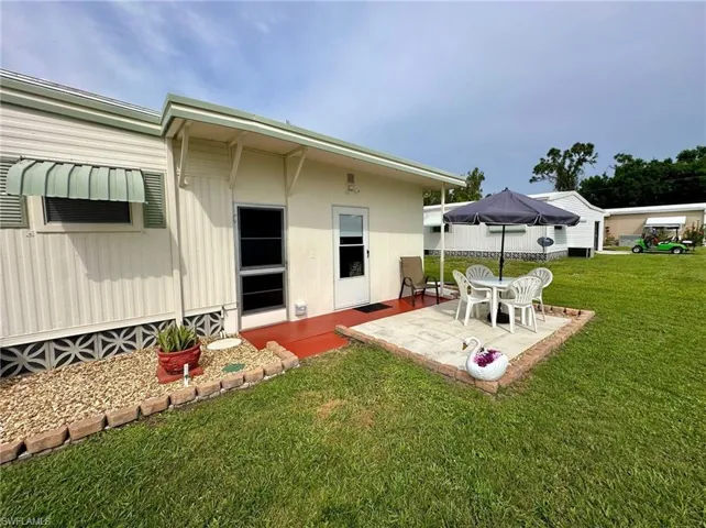 step through to the rear patio and enjoy a lovely view of the ducks on the pond near one of the clubhouses.