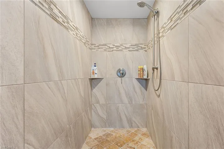 Bathroom with tiled shower