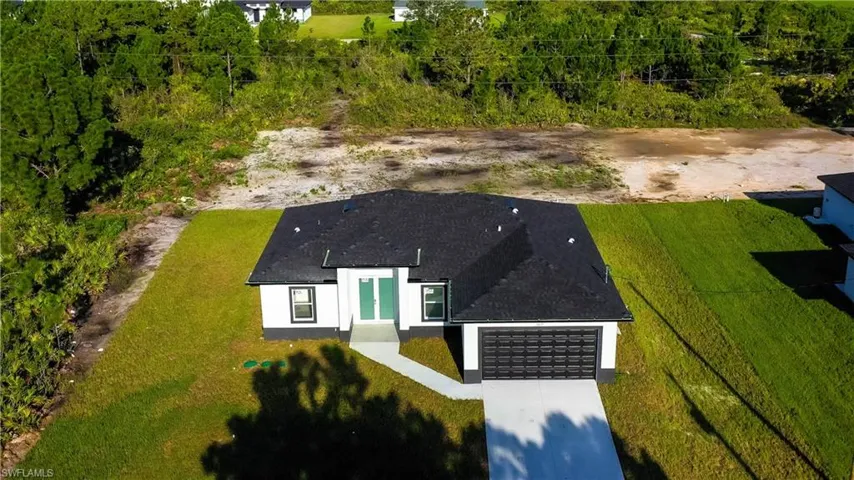 Aerial view of property and surrounding area