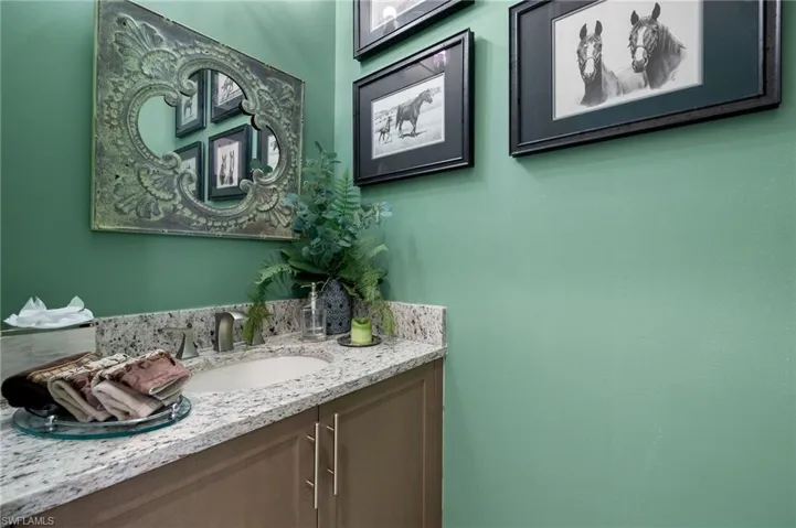 Optional 1/2 bath was a wise choice by sellers!