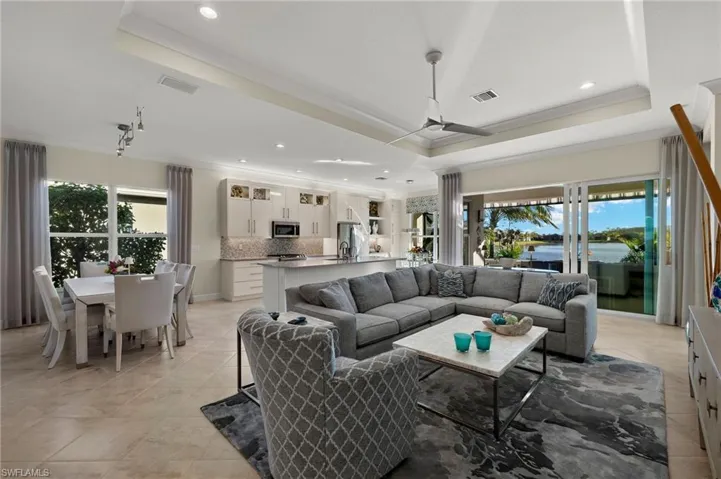 Spacious, open floor plan! Features include: Tray ceiling, comfortable sectional. All furniture conveys (including tv) here except sofa table + mirror.