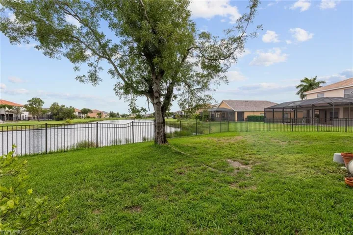 View of yard with a lanai